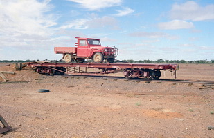 11.5.1978,Flat wagon NRF1049 loaded with 4 wheel drive
