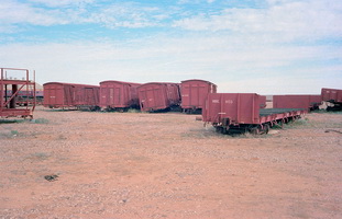 15.5.1981,Marree - narrow gauge rollingstock on ground - NLA826 + NVB + NVB767 + NLA829 + NRE1133 + NRE1103