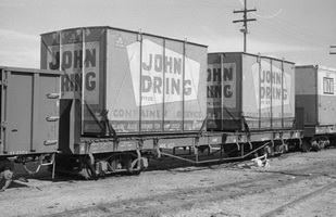 28.8.1976 - Alice Springs - NRE1133 flat with John Dring containers Nos.220 and 46