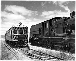 railcar SAR brill 104 crossing loco SAR Garratt 402,Port Pirie to Peterborough