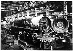 20.2.1943. loco SAR 735 - view of workmen constructing loco in workshop - Islington Workshops